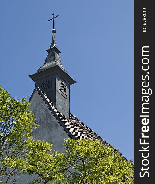 An old christian chapel with a cross