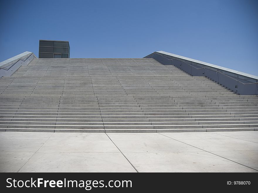 A modern stairway leading up in to no specific destination. A modern stairway leading up in to no specific destination