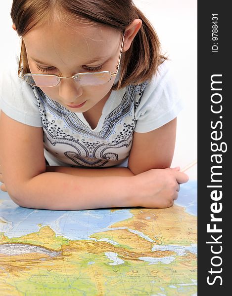 Girl Exploring The Map Of Eurasia