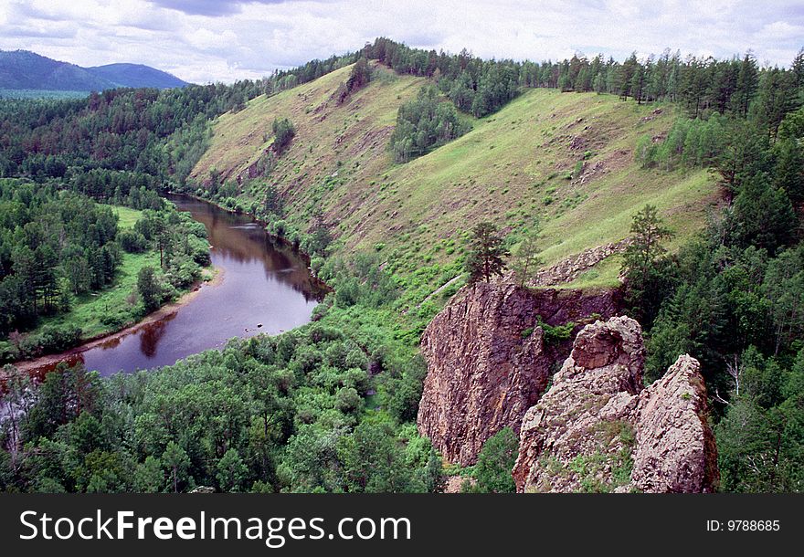 Wild siberian river between mountains