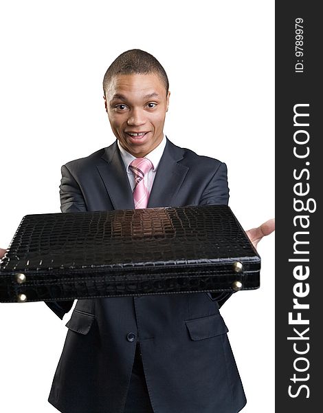 The happy businessman offers briefcase on a white background