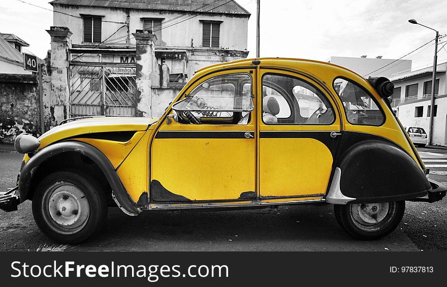 &quot;The CitroÃ«n 2CV &#x28;French: &quot;deux chevaux&quot; i.e. &quot;deux chevaux-vapeur&quot; &#x28;lit. &#x27;steam horses&#x27;&#x29;, &quot;two tax horsepower&quot;&#x29; was an economy car produced by the French car manufacturer CitroÃ«n between 1948 and 1990. It was technologically advanced and innovative, but with uncompromisingly utilitarian unconventional looks, and deceptively simple Bauhaus and Junkers early all metal aircraft inspired bodywork &#x28;corrugated for added strength without added weight&#x29;, that belied the sheer quality of its underlying engineering. It was designed to motorise the large number of small-holder farmers in 1930s France, who were still using horses and carts. It is considered one of CitroÃ«n&#x27;s most iconic cars. In 1953 Autocar in a technical review of the car wrote of &quot;the extraordinary ingenuity of this design, which is undoubtedly the most original since the Model T Ford&quot;. It was described by Car Magazine journalist and author L. J. K. Setright as &quot;the most intelligent application of minimalism ever to succeed as a car&quot;. It was designed for low cost, simplicity of use and maintenance, versatility, reliability, low fuel consumption and off-road driving. For this it had a light, easily serviceable engine, extremely soft long travel suspension &#x28;with height adjustment by lengthening/shortening of tie rods&#x29; high ground clearance, and for oversized loads a car-wide canvas sunroof, which &#x28;until 1955&#x29; also covered the boot. During a production run of 42 years between 1948 and 1990, 3,872,583 2CVs were produced, plus 1,246,306 Fourgonnettes &#x28;small 2CV delivery vans&#x29;, as well as spawning mechanically identical vehicles including the Ami: 1,840,396; the Dyane: 1,444,583; the Acadiane: 253,393; and the Mehari: 144,953, a grand total of 8,756,688, of which there are still 3,382 on the road in the UK as of January 2013. From 1988 onwards, production took place in Portugal &#x28;Mangualde&#x29; rather than in France. This arrangement lasted for two years until 2CV production halted. Portuguese built cars, especially those from when production was winding down, have a reputation in the UK for being much less well made and more prone to corrosion than those made in France. Paradoxically the Portuguese plant was more up-to-date than the one in Levallois near Paris, and Portuguese 2CV manufacturing was to higher quality standards&quot; Source: Wikipedia en.wikipedia.org/wiki/Citro%C3%ABn_2CV