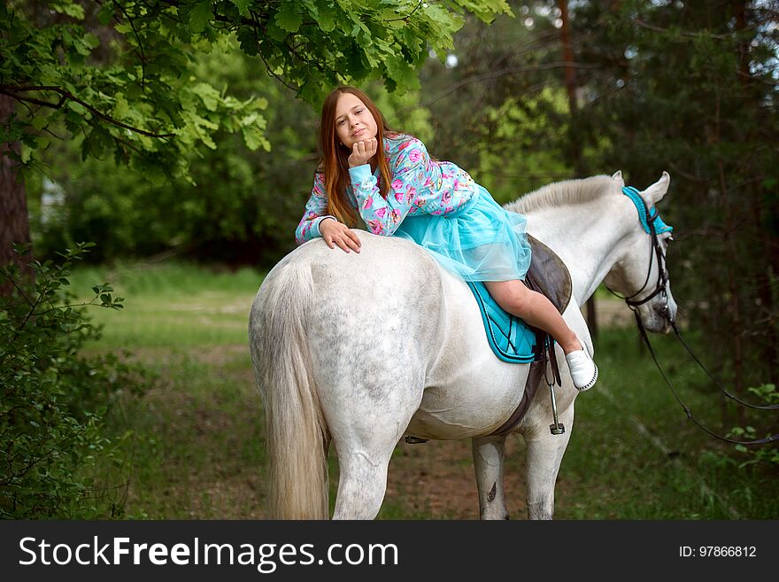 Redhead Girl And White Horse In The Forest