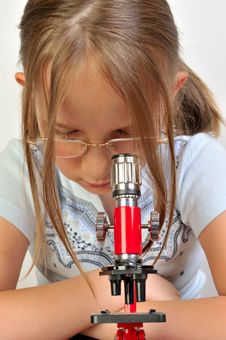Girl Studying Something With Microscope Stock Photos Girl Studying Something With Microscope Stock Photos