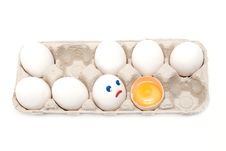 Egg Looks At Broken Person Royalty Free Stock Photo