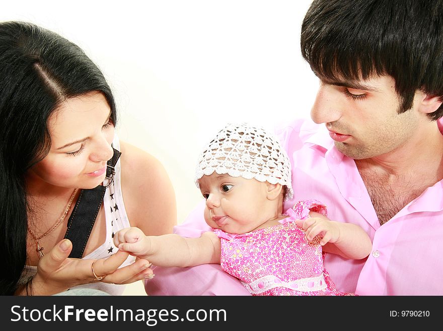 Happy family with baby daughter over white portrait