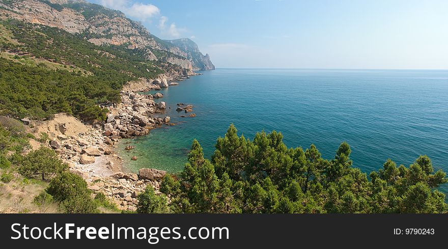 Horizontal panorama of rocky coastline