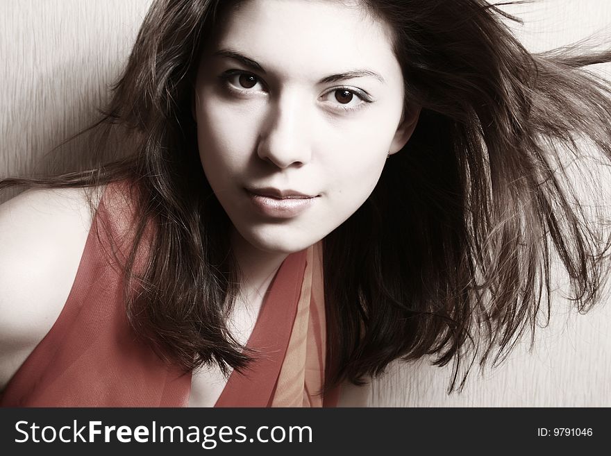 Portrait of the young brunette close up.