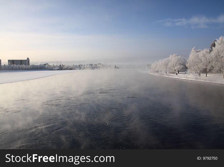 Very cold day, view over a river in Finland