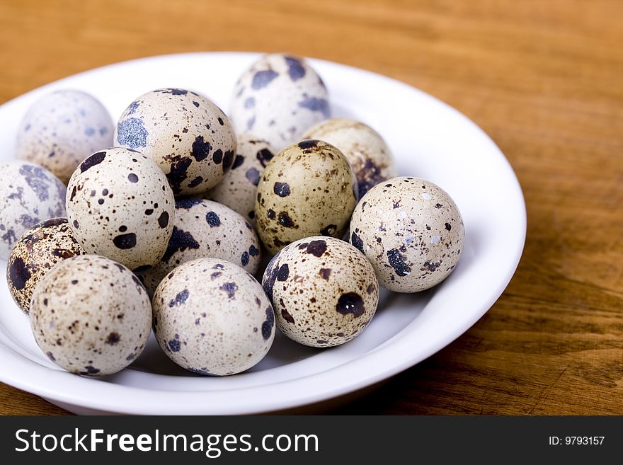 Partridge eggs served on a plate