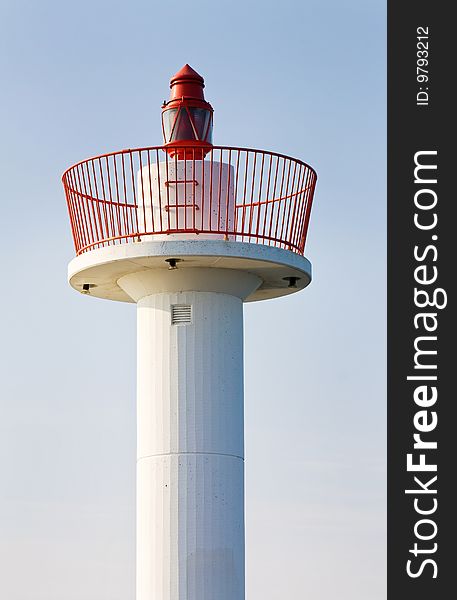 White lighthouse at sunset in Howth, Dublin