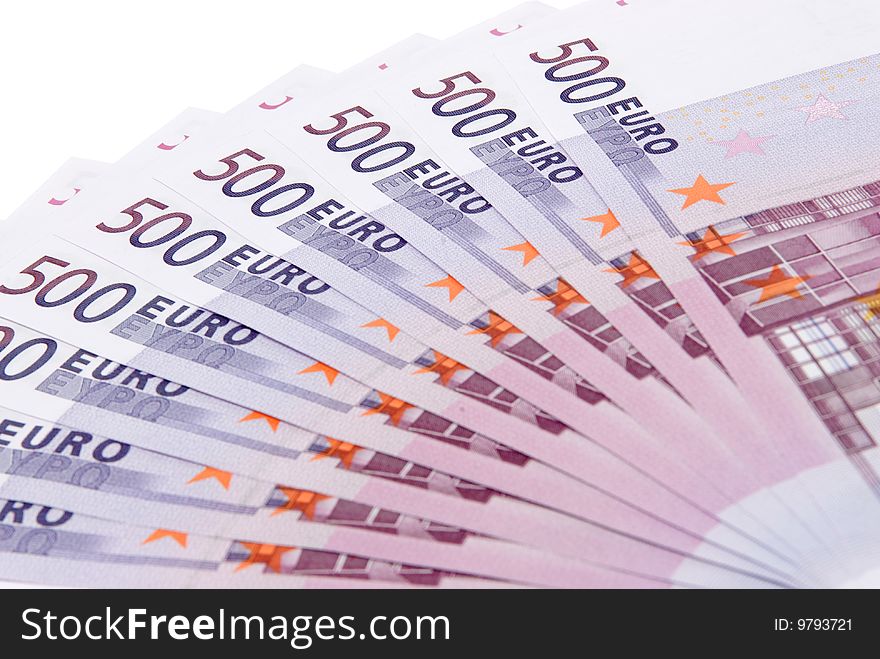 Euro banknotes closeup on white