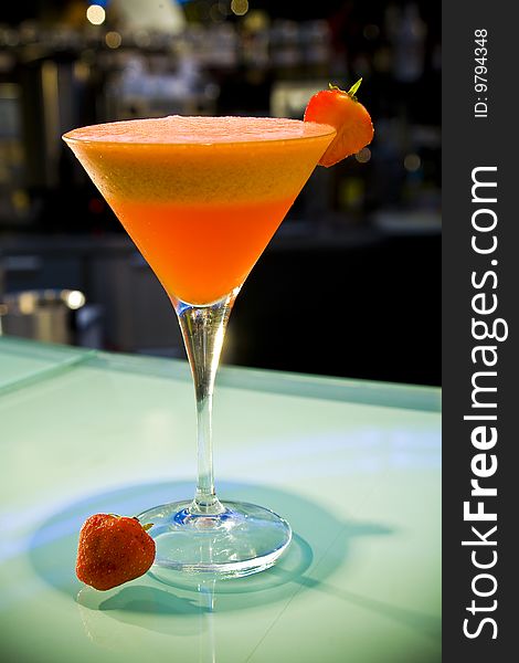 Alcohol cocktail with fruits in bar
