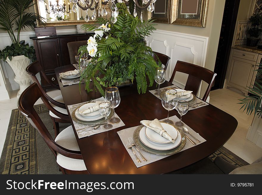 Dining table with luxurious tableware and decor. Dining table with luxurious tableware and decor.