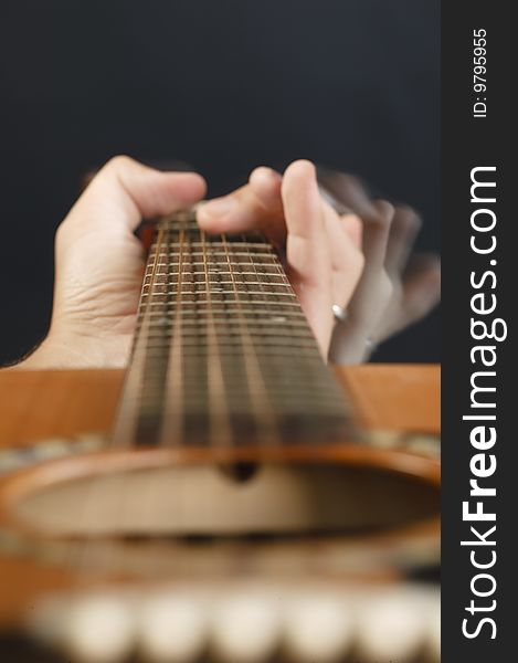 Macro of a guitar players fingers. Macro of a guitar players fingers