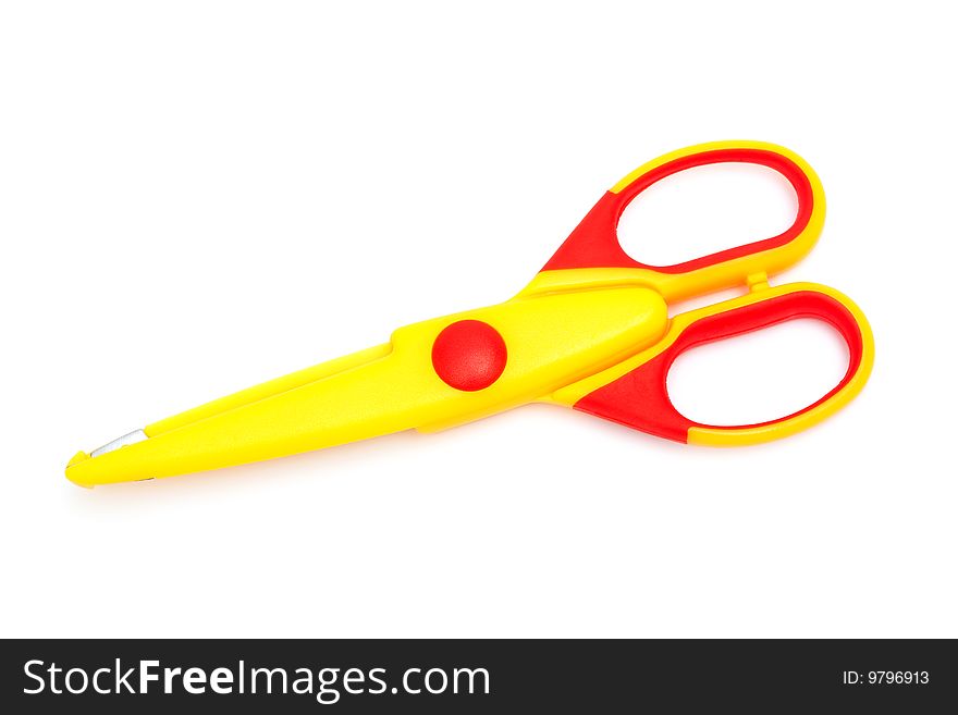 Modern yellow scissors on a white background