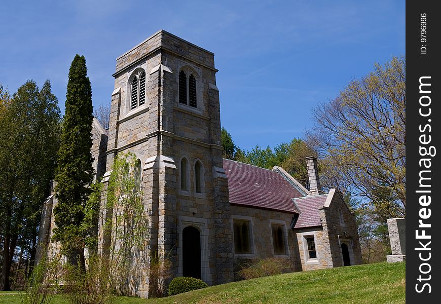 A stone chapel on a spring day