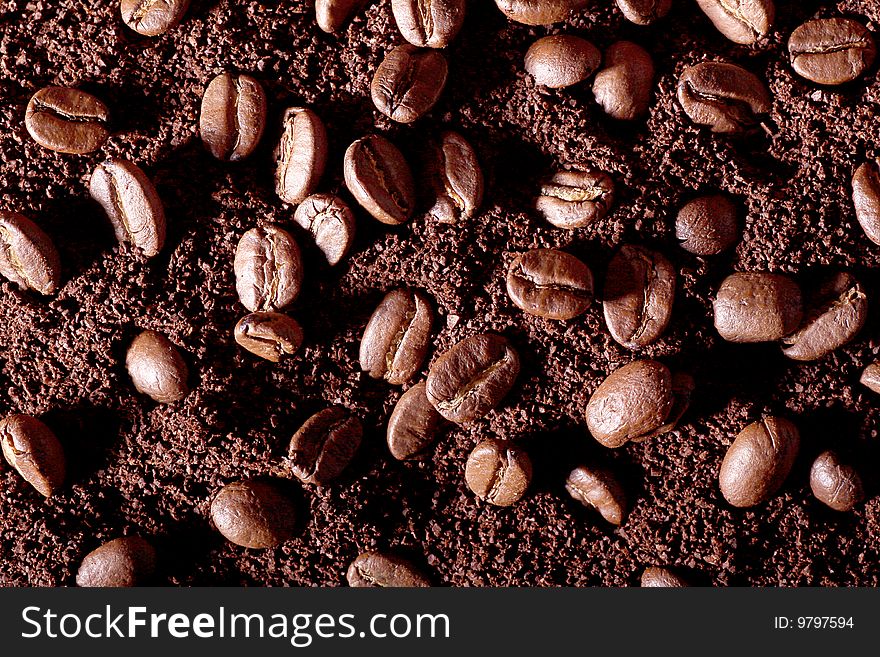 Beans and milled coffee background. Beans and milled coffee background.
