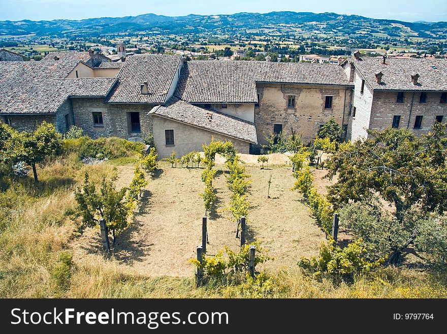 Umbrian typical houses surrounded by cultivated fields. Umbrian typical houses surrounded by cultivated fields