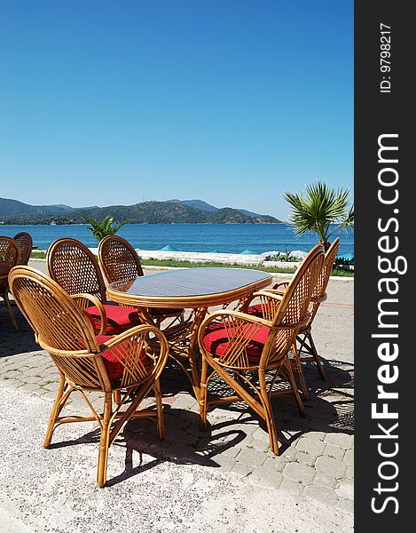 Tables and chairs near sea beach