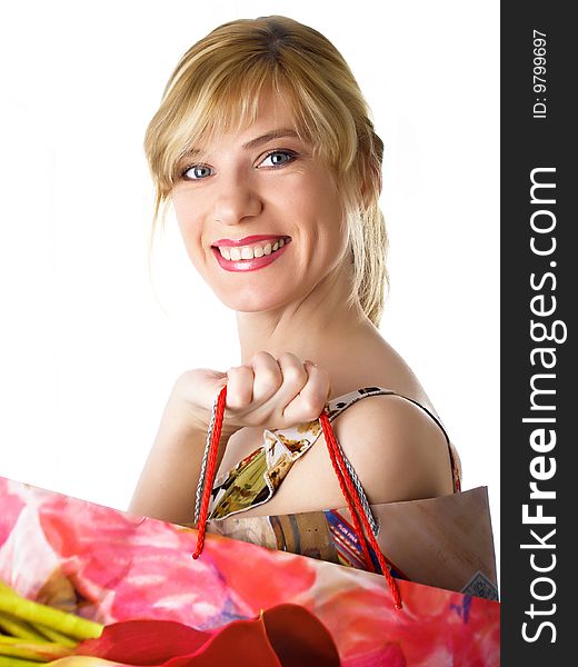 Happy cute young woman shopping on the white background. Happy cute young woman shopping on the white background