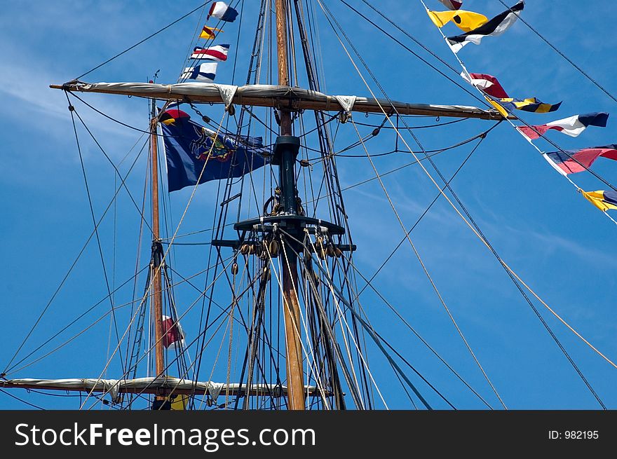 Detail of a tall ship showing the main mast and cross oiece. Detail of a tall ship showing the main mast and cross oiece.