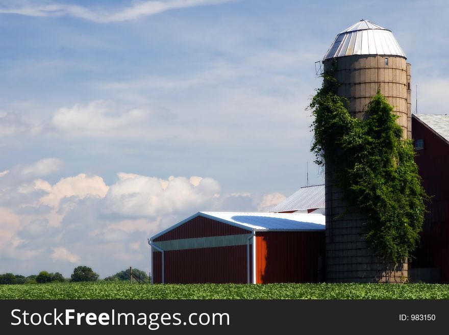 Illinois red farm house with dramatic sky. Illinois red farm house with dramatic sky