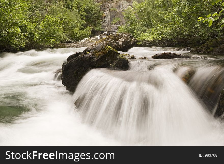 Composite image (4 originals) of Liberty falls cascade flow downstream from main waterfall