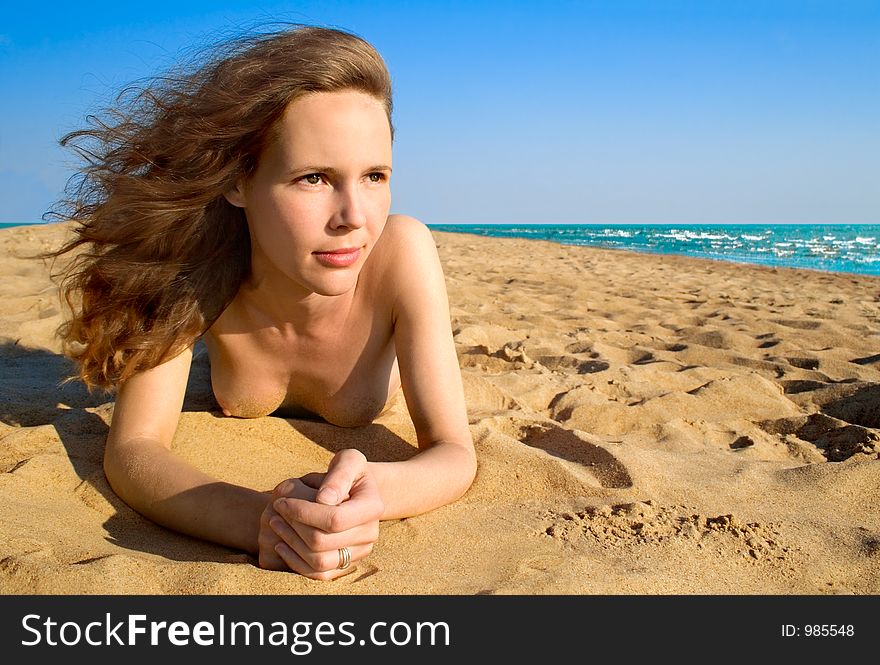 Girl Laying On A Beach-1