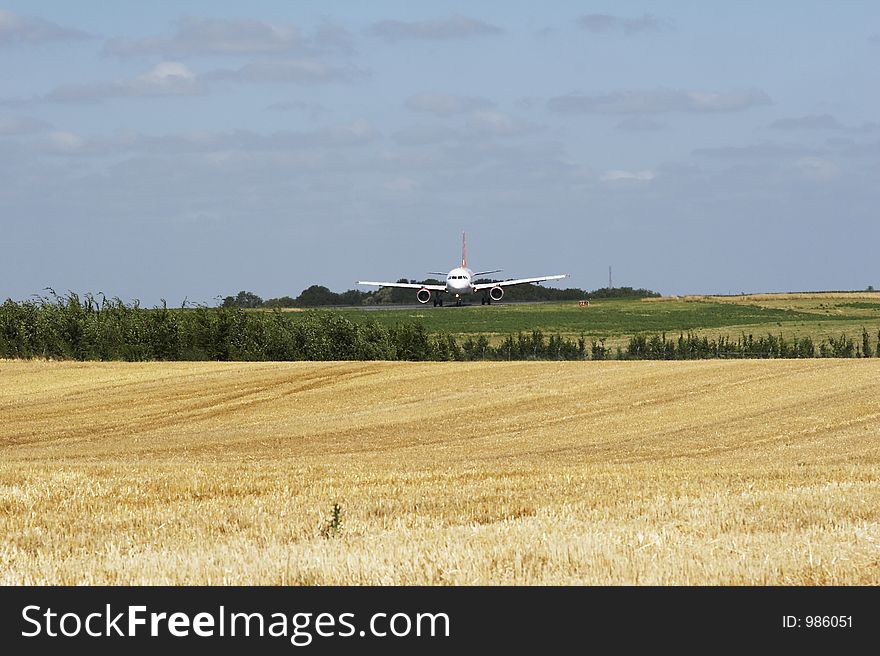 Cornfield - harvest in germany - aeroplane behind. Cornfield - harvest in germany - aeroplane behind