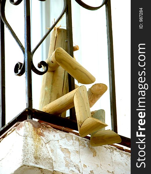 Wooden toy on a balcony