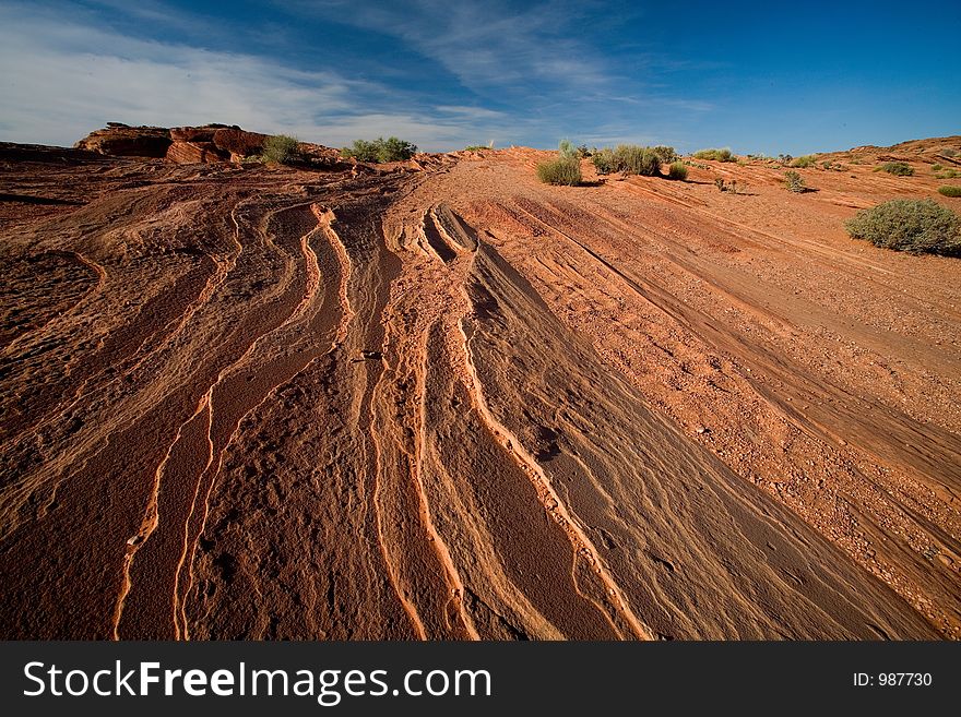 Colorful, rocky desert at sunset