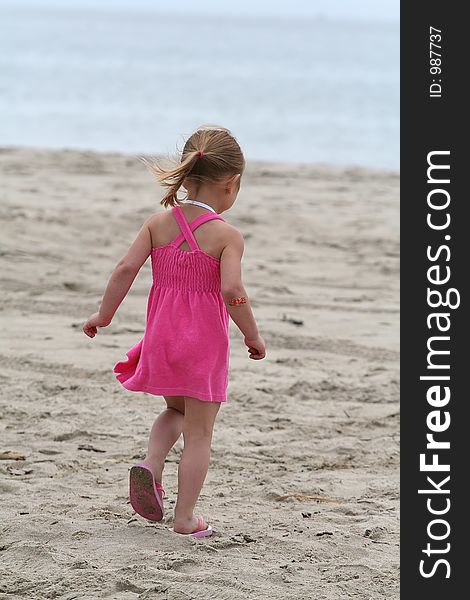 Girl in pink dress at the beach. Girl in pink dress at the beach