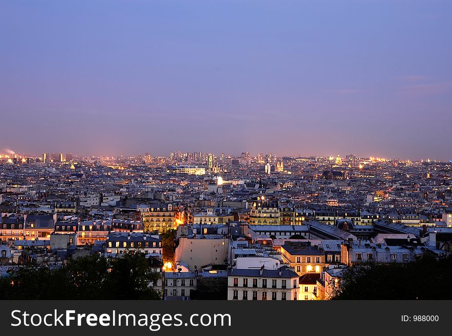 Early evening in Paris - a wide view from stairs at Basilica Sacre Ceur, Monmartre. Early evening in Paris - a wide view from stairs at Basilica Sacre Ceur, Monmartre