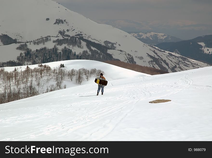 Man walking and preparing for extreme sport. Man walking and preparing for extreme sport