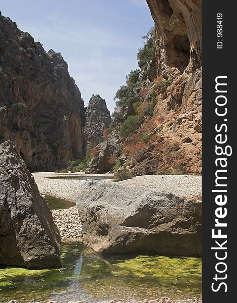 Dried river gorge between two mountains