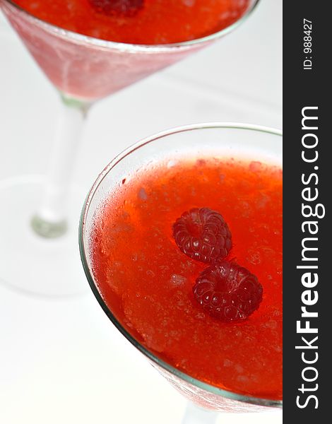 Raspberry Martini on backlit background. Raspberry Martini on backlit background