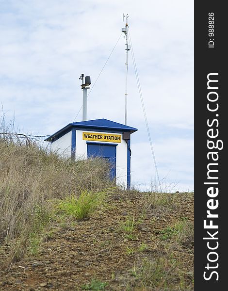 A power plant's weather station on top of a hill