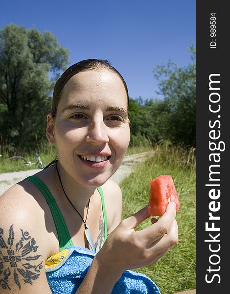 Woman about to eat watermelon