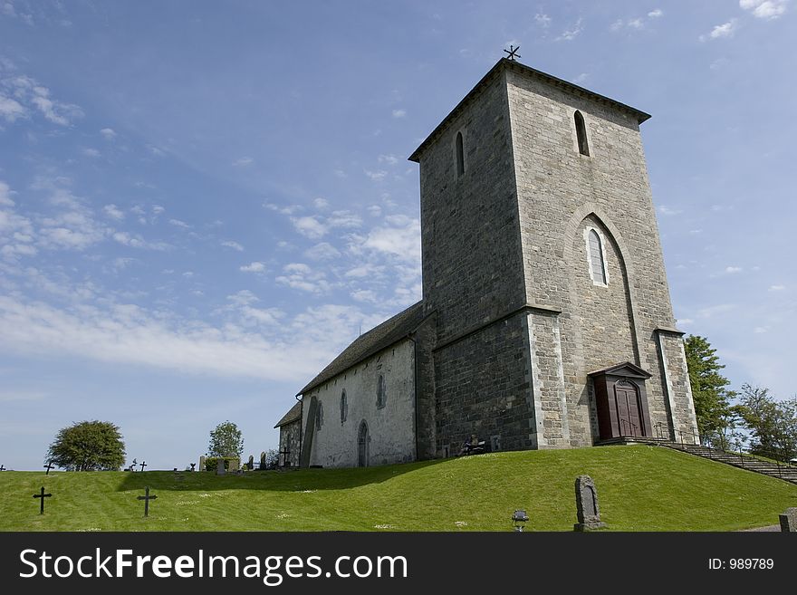 Side of old vintage stone church