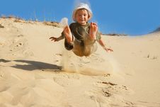Boy Jumping In Sands Royalty Free Stock Photography Boy Jumping In Sands Royalty Free Stock Photography