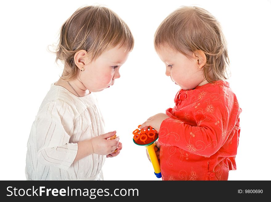 Two little funny girls on white background