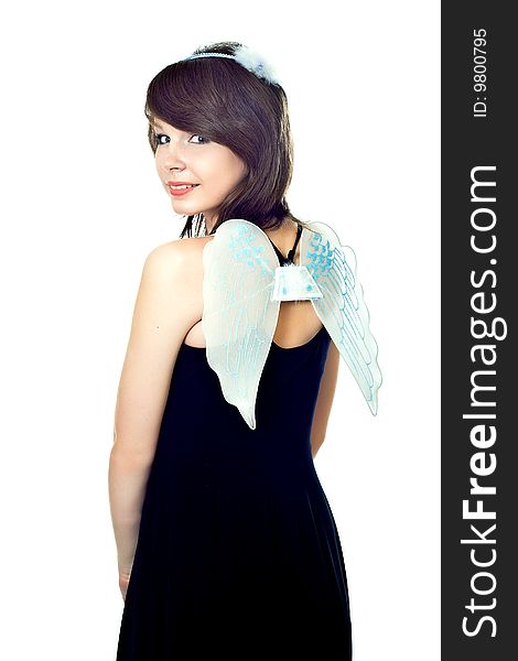 Young pretty girl in black dress on white background