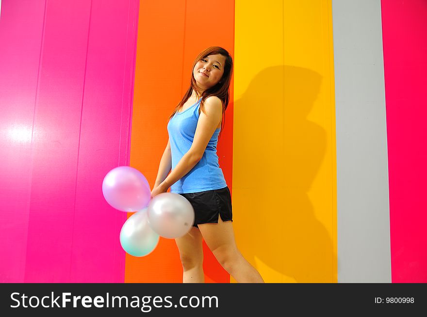 Young Asian Woman Holding Balloon Getting Ready For Party. Young Asian Woman Holding Balloon Getting Ready For Party.