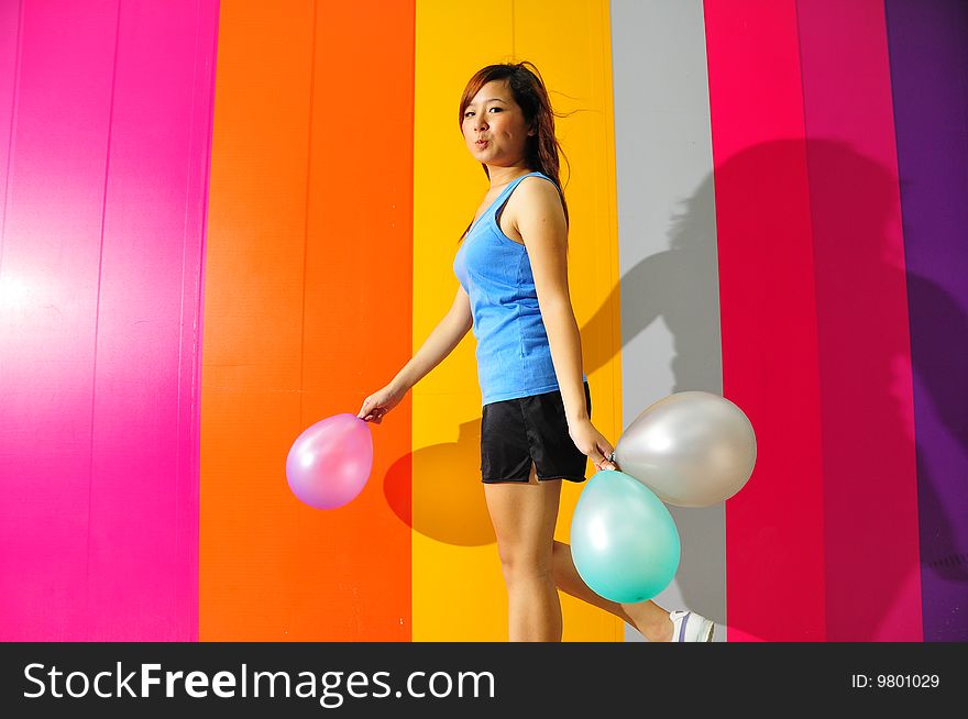 Young Asian Woman Holding Balloon Getting Ready For Party. Young Asian Woman Holding Balloon Getting Ready For Party.