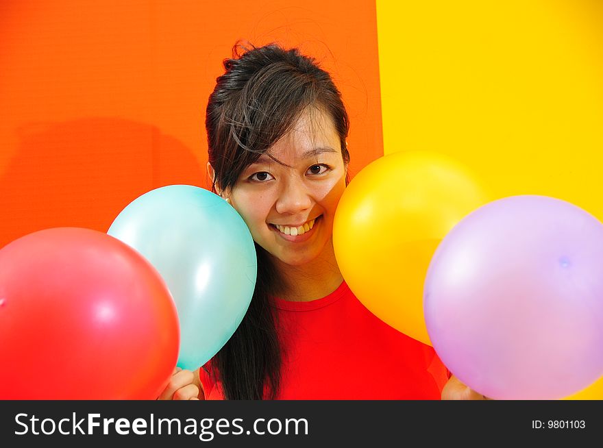 Young Asian Woman Holding Balloon Getting Ready For Party. Young Asian Woman Holding Balloon Getting Ready For Party.