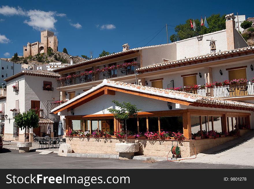 Spain castle on the hill overlooking small city. Andalusia, Spain. 2009