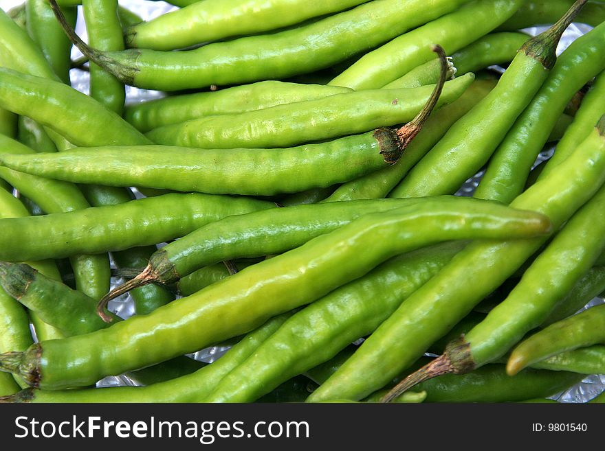 Hot, green chilli used to prepare spicy food. Hot, green chilli used to prepare spicy food