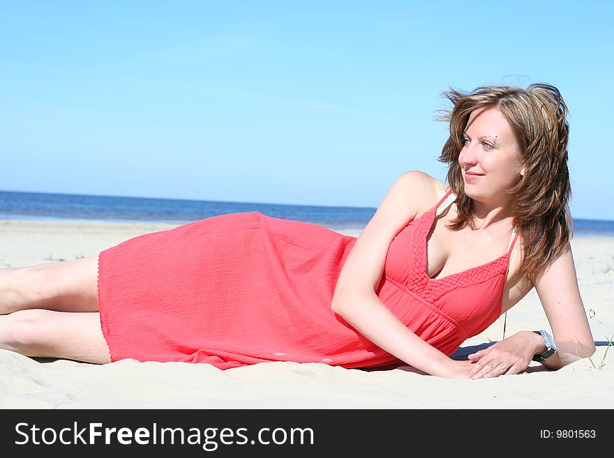 Young girl relaxing on the beach. Young girl relaxing on the beach