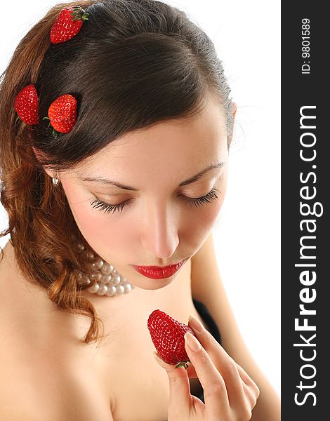 Sexy young woman eating fresh strawberry. Sexy young woman eating fresh strawberry